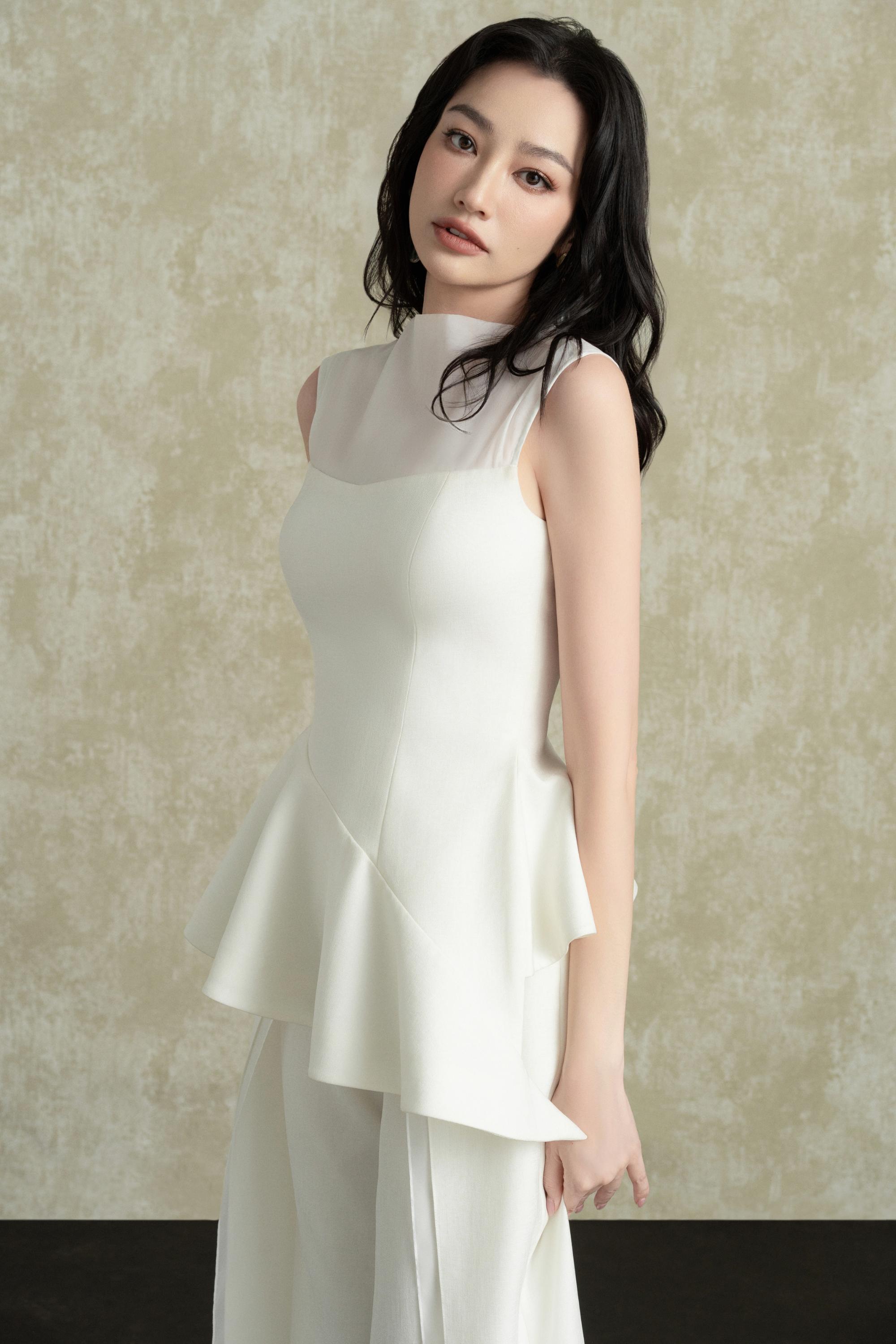 Maela Asymmetric Peplum Top